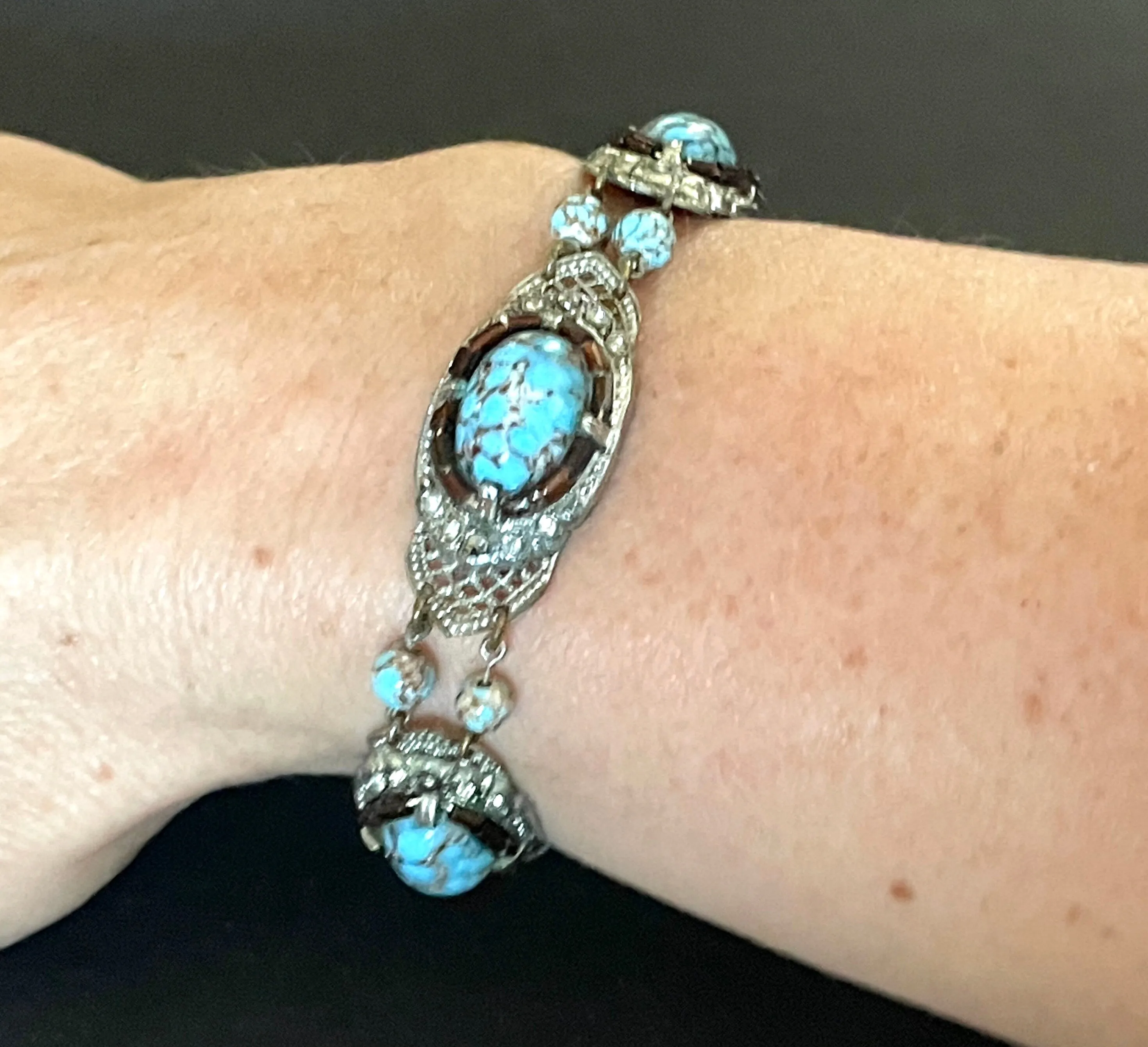 Vintage Art Deco Czech turquoise blue glass cabochon, paste rhinestone and marcasite silver tone filigree panel bracelet, Neiger style