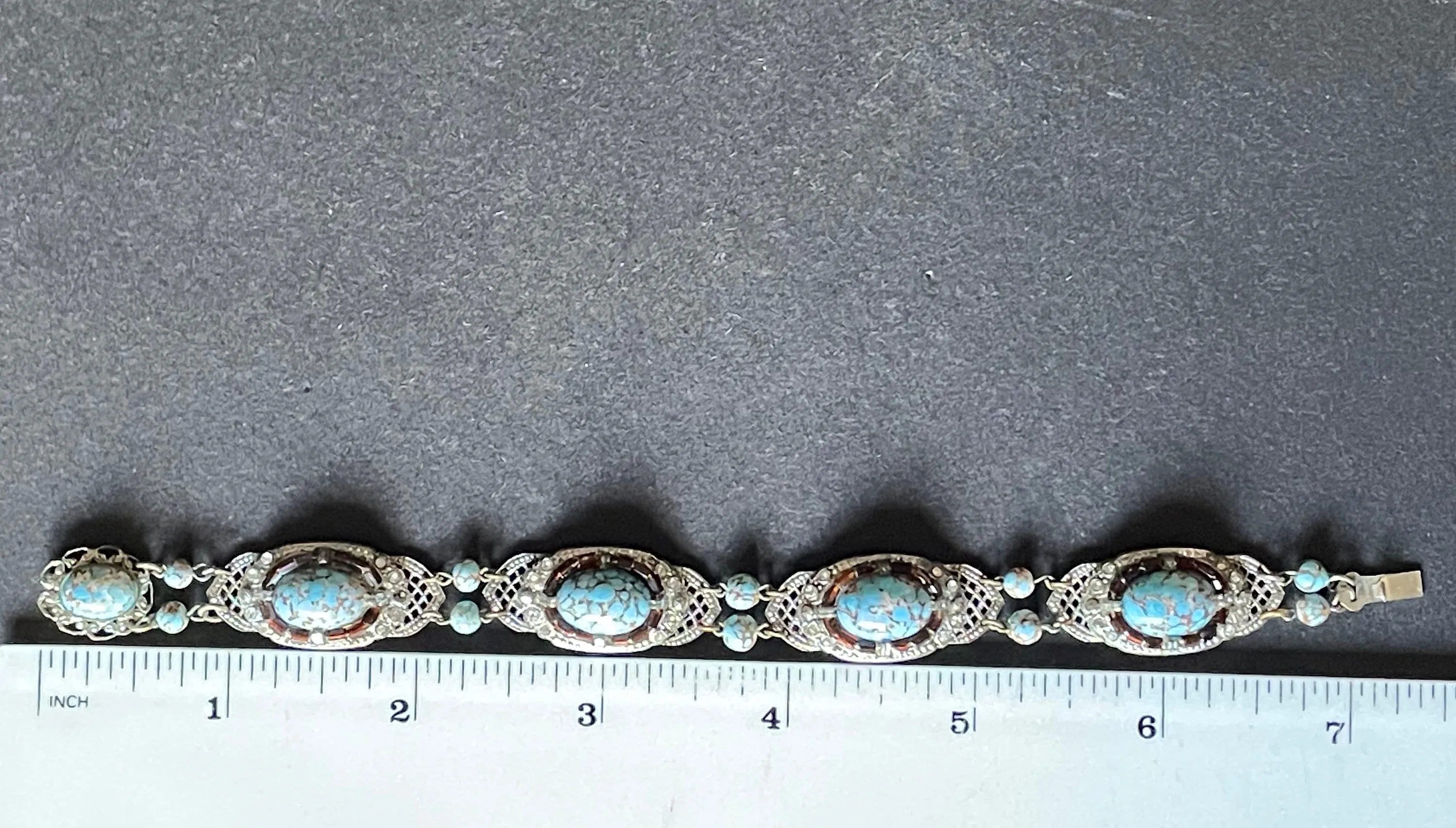 Vintage Art Deco Czech turquoise blue glass cabochon, paste rhinestone and marcasite silver tone filigree panel bracelet, Neiger style