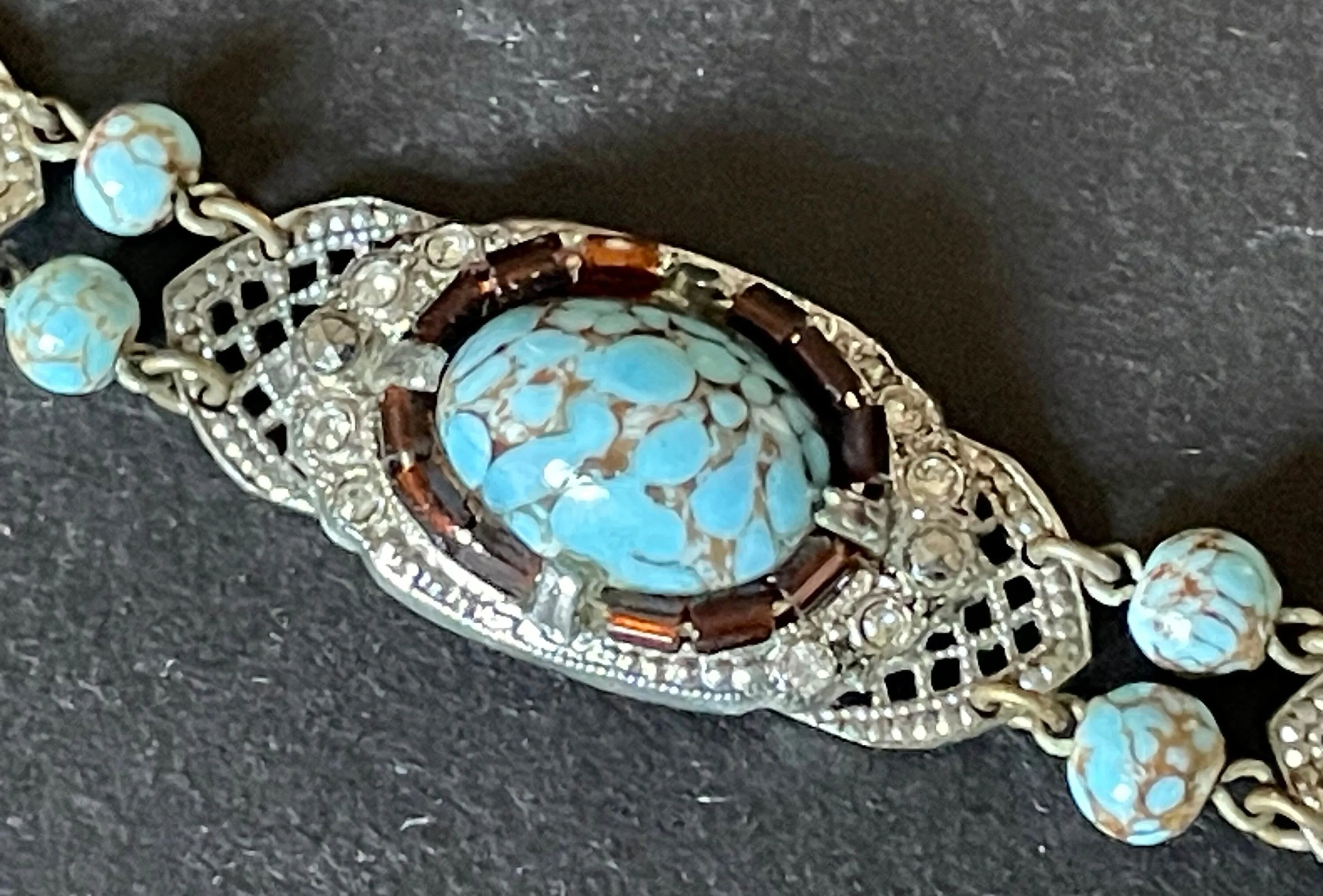 Vintage Art Deco Czech turquoise blue glass cabochon, paste rhinestone and marcasite silver tone filigree panel bracelet, Neiger style