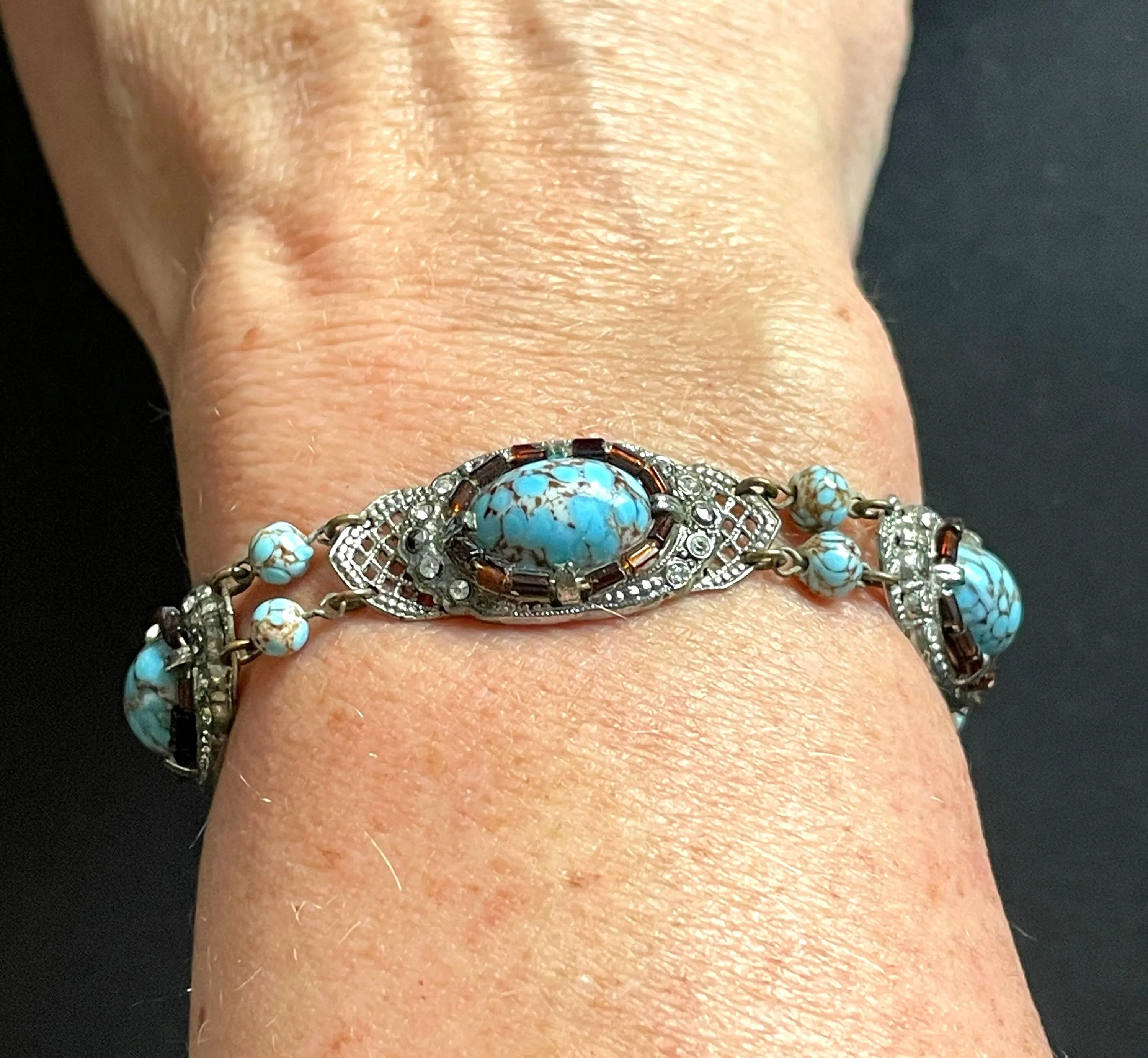 Vintage Art Deco Czech turquoise blue glass cabochon, paste rhinestone and marcasite silver tone filigree panel bracelet, Neiger style
